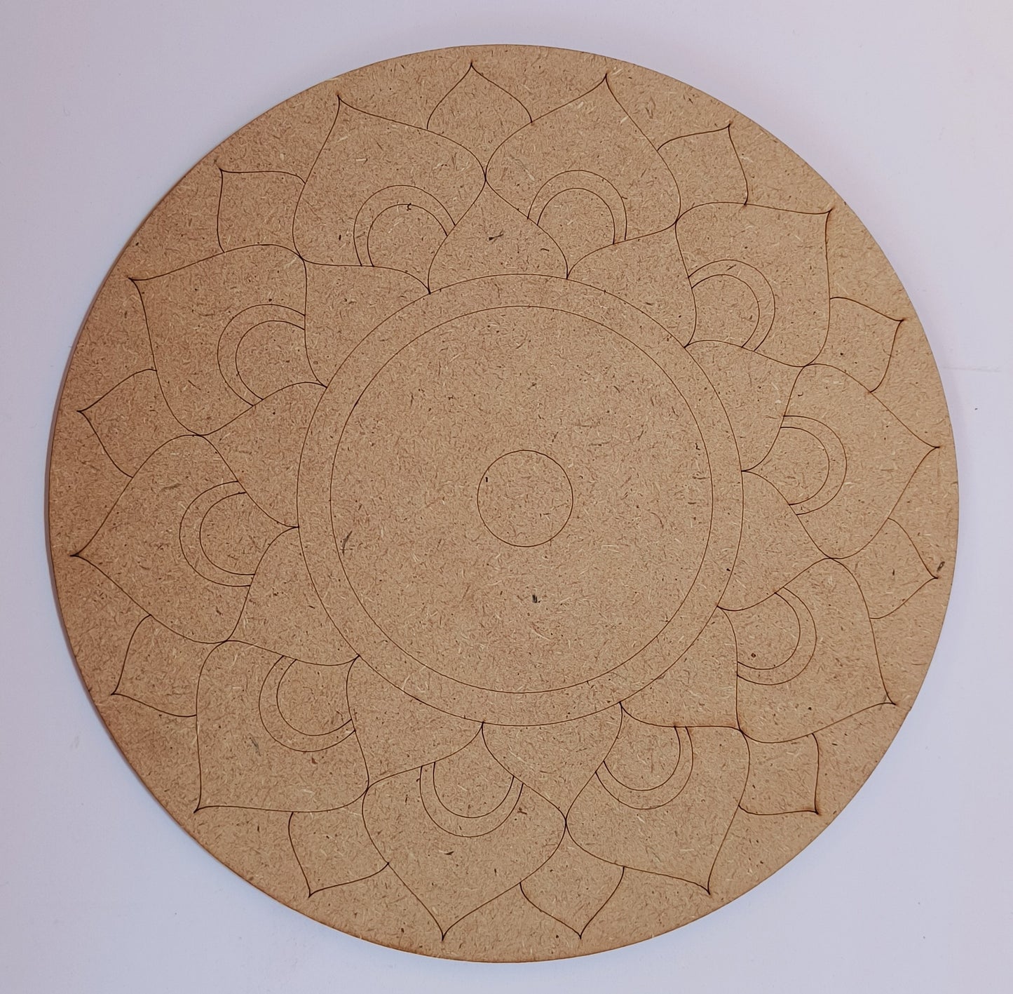 Round MDF cutout pre-marked with beautiful mandala design.